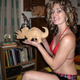 Illustration for article titled Dinosaurs + Confused Bikini Models = The Internets New Strangest Site